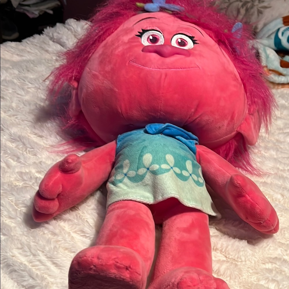 Pink Fluffy Stuffed Animal with Expressive Eyes